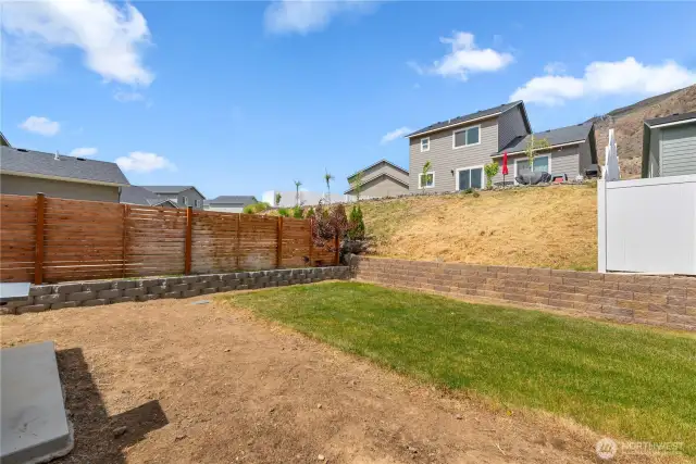 Retaining wall and partial fence