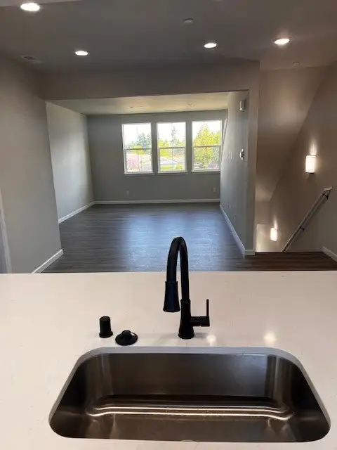 View over Kitchen island to Dining Example Only