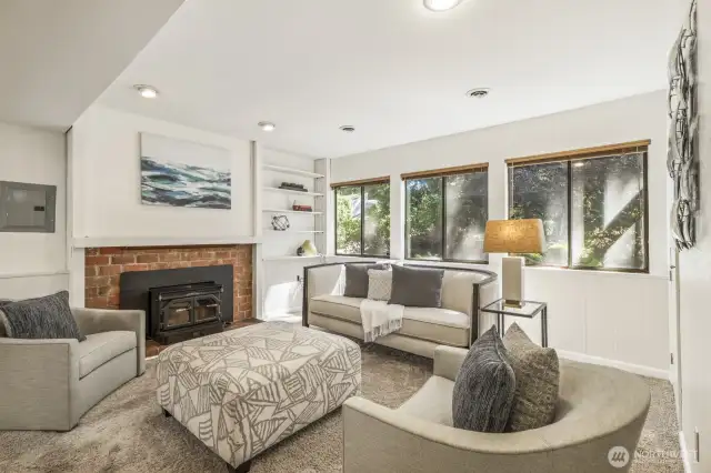 Tall ceilings and walls of windows downstairs