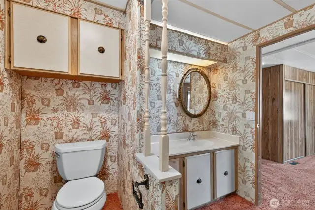 Tons of room in this primary bathroom suite.