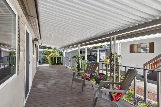 Heading outside, find space to relax on this great covered patio!