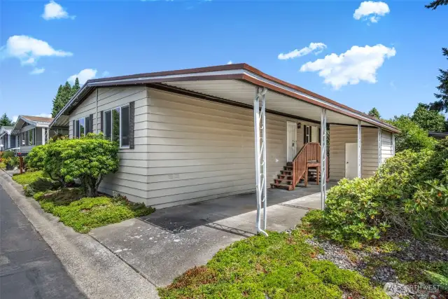 This home also has a large attached carport.