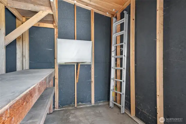 This storage room is at the end of the carport.