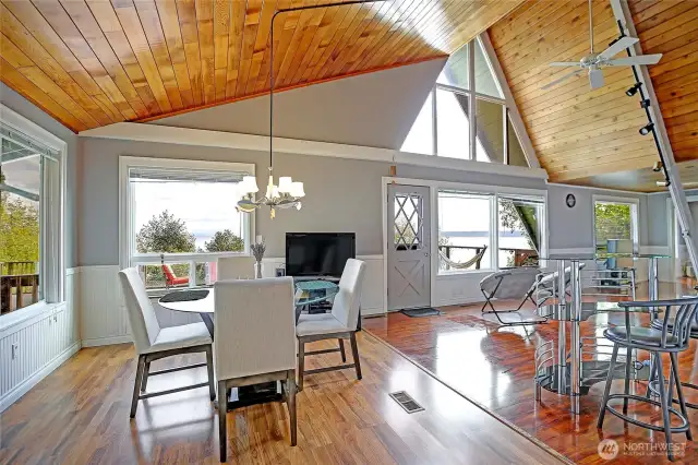 Soaring vaulted ceilings and breathtaking water and mountain views from every room.