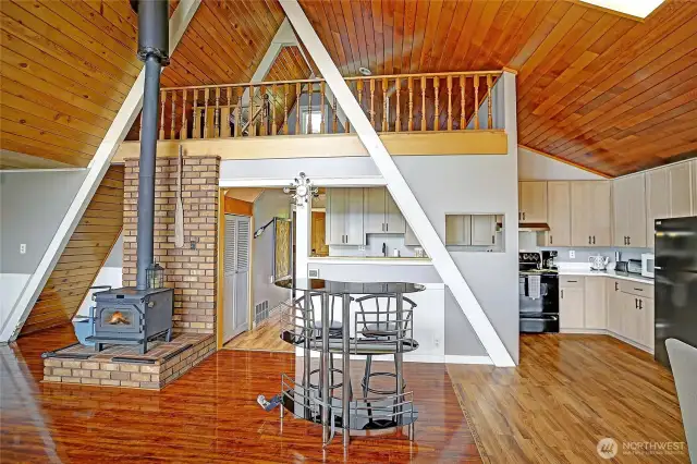 Open and flooring floorplan with soaring ceiling, lots of windows, natural light, and stunning views.