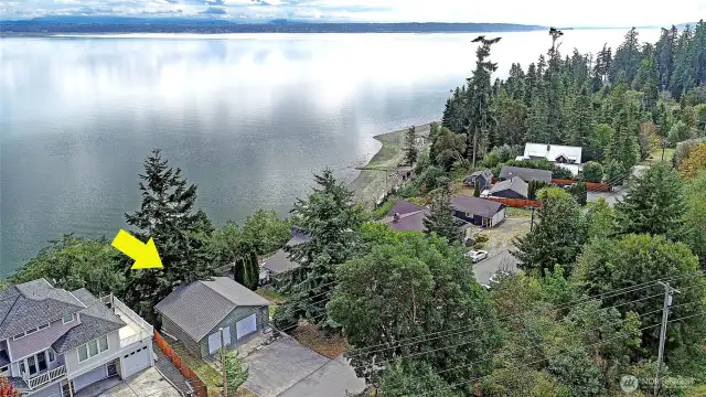 21,000+ SqFt lot with 96 ft of sound waterfront.