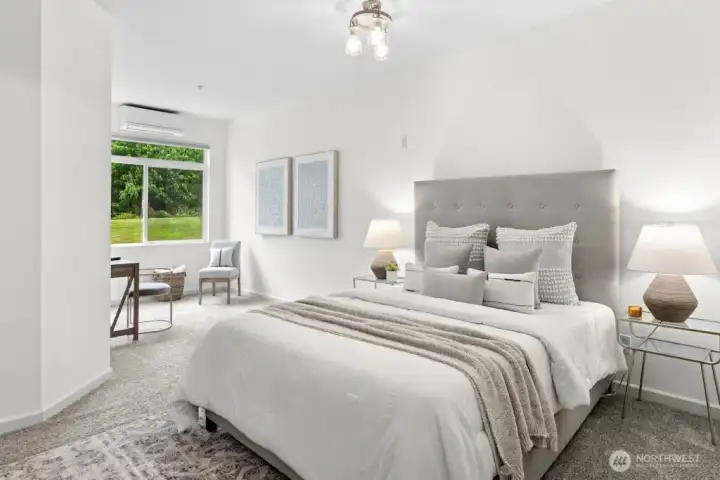 Expansive primary suite with sitting area overlooking the greenbelt and grassy knoll - deal for an office, reading nook, or your own special retreat.