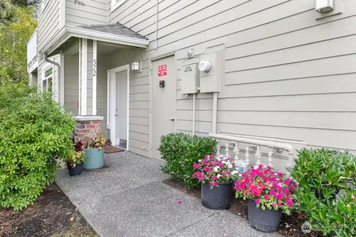 Enjoy main floor living with no stairs, tucked privately behind the building for a peaceful yet easily accessible lifestyle.