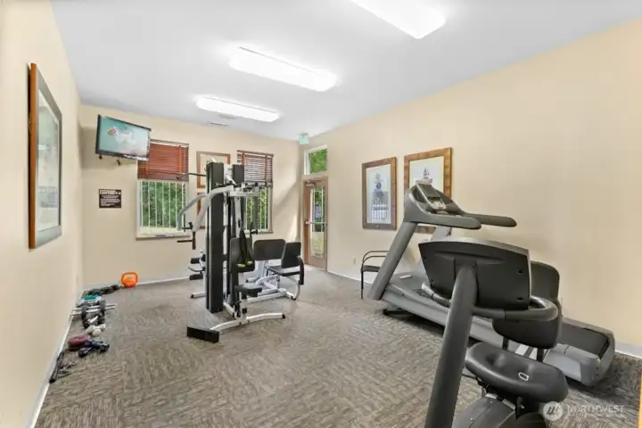 Stay active in the community workout room, featuring a variety of equipment, views of the greenbelt, and a TV to keep you entertained while you exercise.