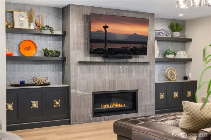 Fireplace and storage area in living space.
