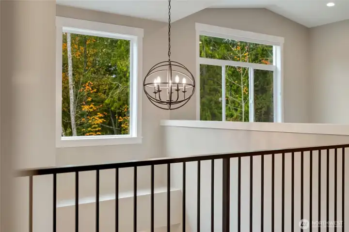 “A peaceful transition space that feels open, airy, and connected to nature.”