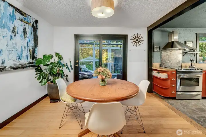 Dining area, open to kitchen, sunroom and living area.