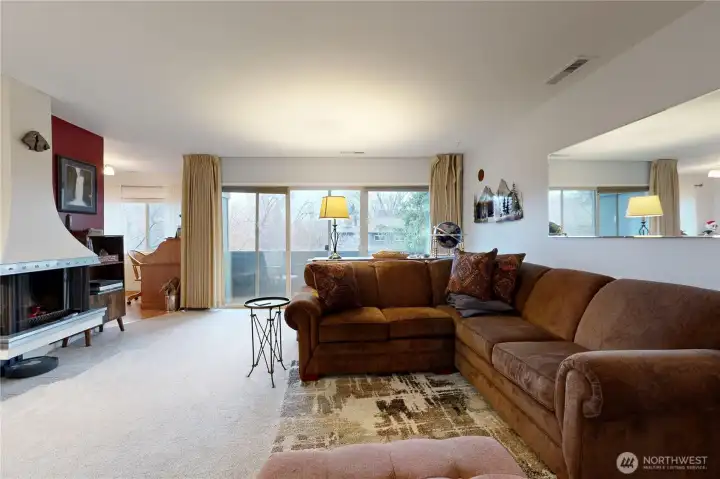 Living room has fireplace