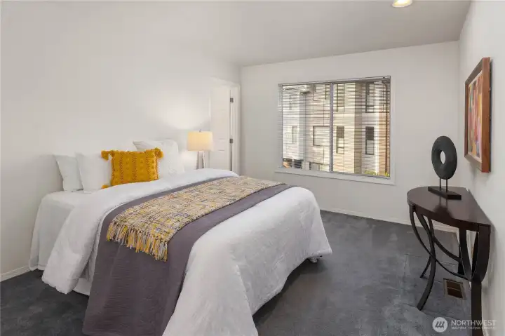 Upper-level bedroom w/walk-in closet & en suite bathroom