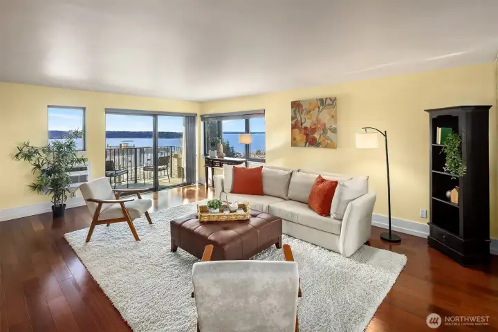 Sunny, light-filled and beautifully updated 3-bedroom corner condo offering sweeping west-facing views of Elliott Bay, West Seattle, and the Olympic Mountains — your own front-row seat to Seattle’s spectacular sunsets!