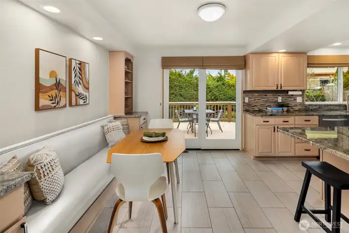 kitchen flows to outdoor back deck + yard