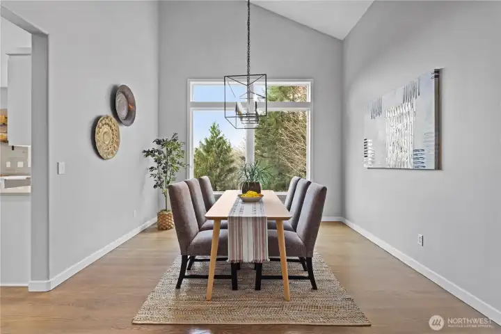 Family dining with vaulted ceilings