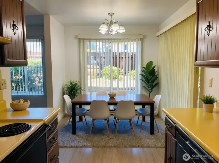 8848 kitchen and dining area with sliding door to the yard.