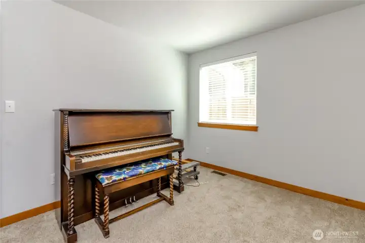 Bedroom #2. The piano has been removed