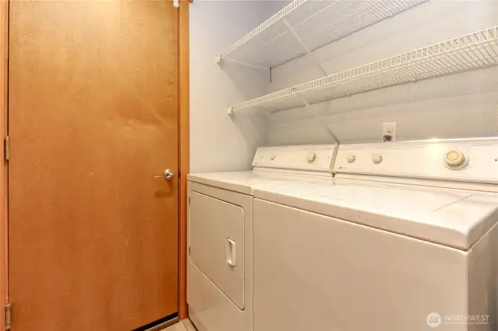 Laundry room with door to garage