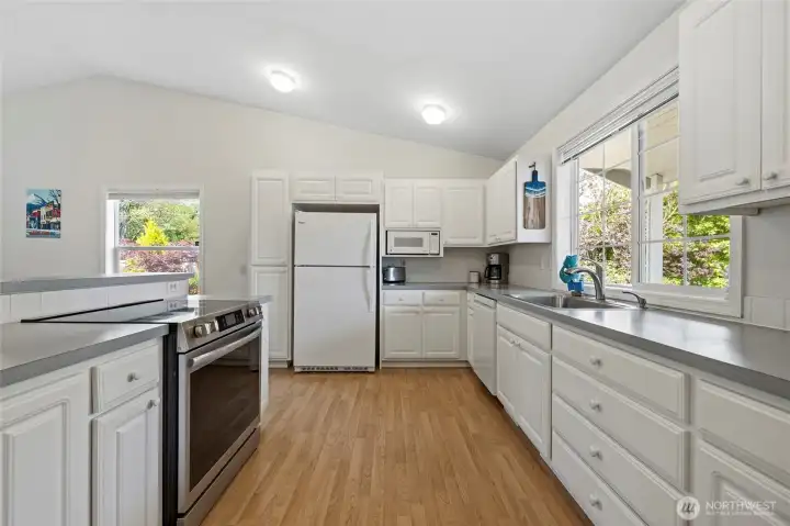 The kitchen offers an inviting flow and generous space, perfect for everyday living and ready to host gatherings with family and friends. The kitchen offers an inviting flow and generous space, perfect for everyday living and ready to host gatherings with family and friends.