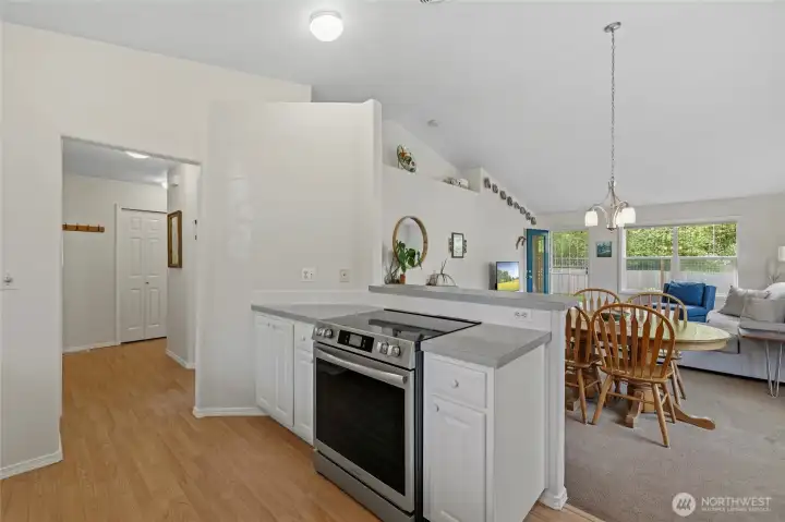 The spacious island opens seamlessly into the dining and living rooms, creating the perfect layout for entertaining and everyday connection. The spacious island opens seamlessly into the dining and living rooms, creating the perfect layout for entertaining and everyday connection.