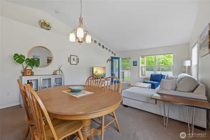 The dining room flows effortlessly to the living area and then to incredible backyard covered deck The dining room flows effortlessly to the living area and then to incredible backyard covered deck