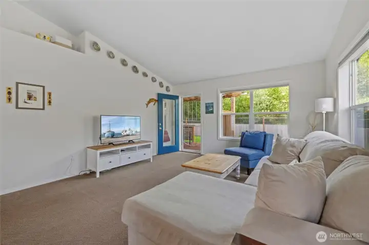 Spacious and open living room with plenty of room for everyone to gather, relax, and enjoy. Spacious and open living room with plenty of room for everyone to gather, relax, and enjoy.