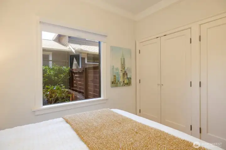 Dual closets provide extra storage.