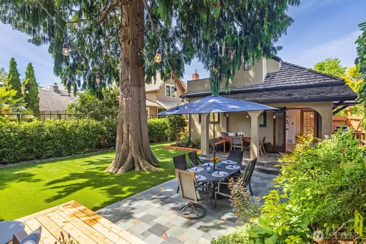 Gorgeous, fully-fenced backyard retreat with fresh landscaping.