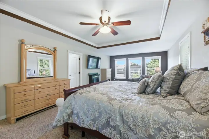 Luxurious primary suite with sitting area.