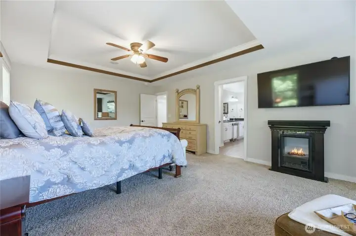 Luxurious primary suite with sitting area.