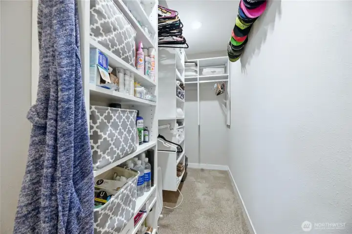 2nd Primary Walk-In Closet - outfitted with premium California Closet system.