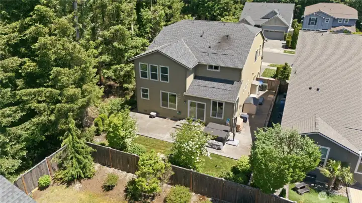 Drone view of backyard and back of house.