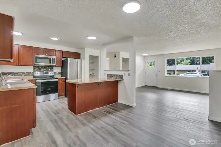 Stainless steel appliances include Double Refrigerator, range, microwave & dishwasher!