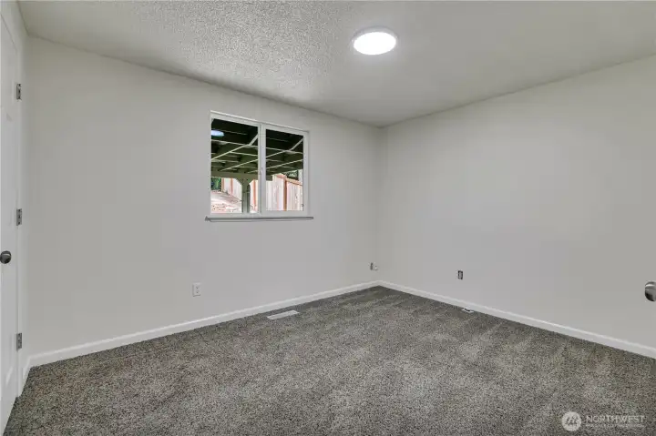 Updated flooring, paint, window coverings and white-on-white six-panel doors!
