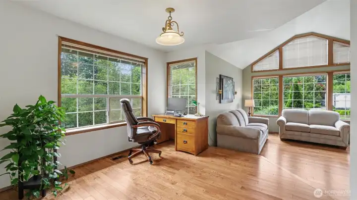 Formal dining space. Seller uses as an office space