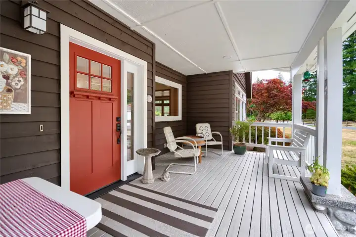 Large covered front porch with seating areas highlight the front of this home. Large covered front porch with seating areas highlight the front of this home.