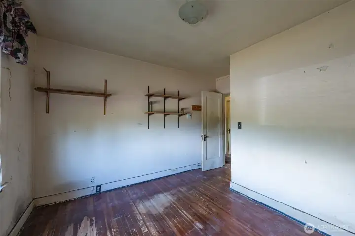 First larger bedroom w/ closet