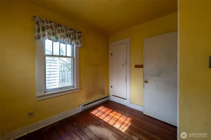 Second smaller bedroom and attic entrance