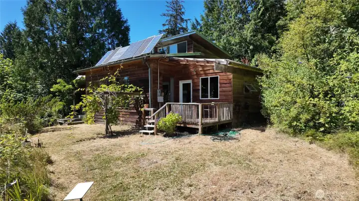 Front side of cabin. Solar panals on roof