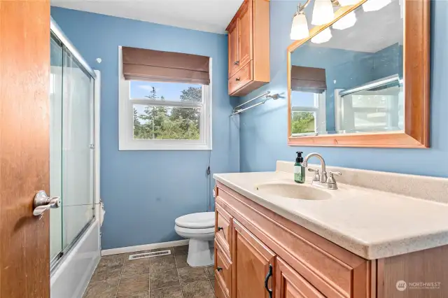Updated bathroom with power flush toilet.