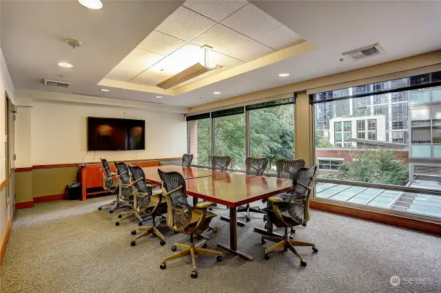 Conference room (South Tower, 2nd Floor)including table, projector w/HDMI & VGA monitor port cables.