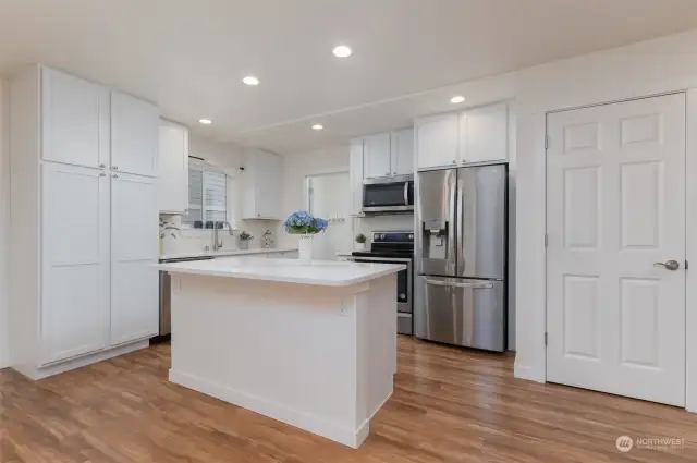 All stainless appliances in this open concept kitchen.