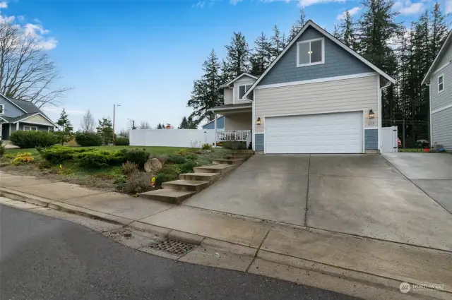 Driveway showing added parking to the right.