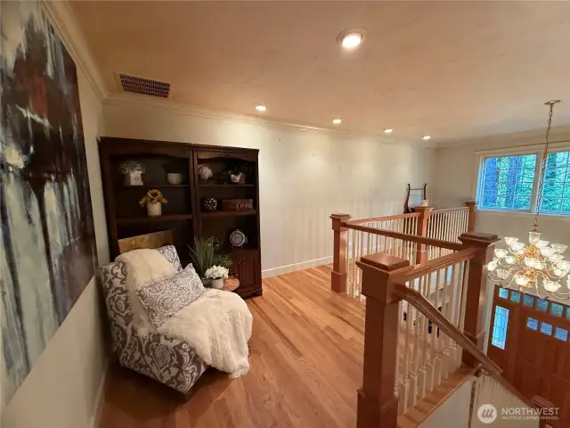 Landing area w/ tons of room for a reading nook or an additional workspace, endless possibilities!