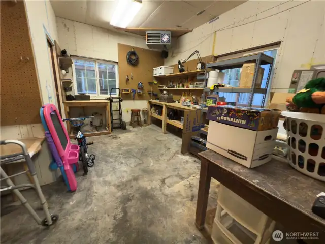 Heated shop area w/ 1/2 bath.