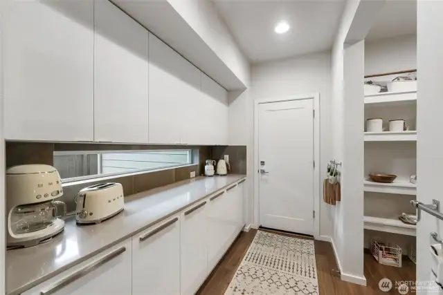 This is just the beginning of the incredible Butler's pantry.