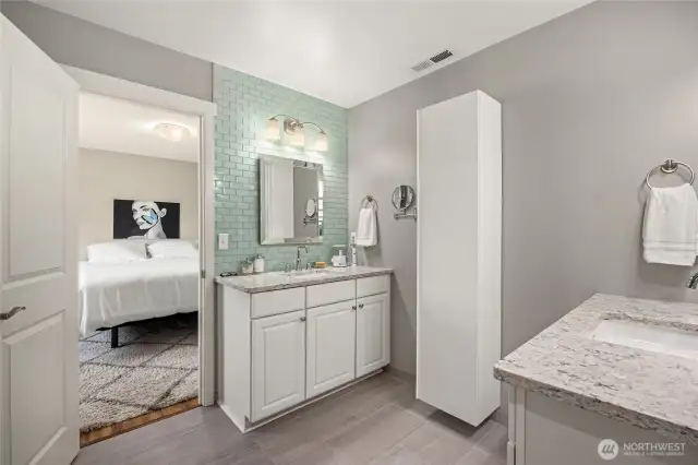 Primary bedroom bathroom with his/her vanities