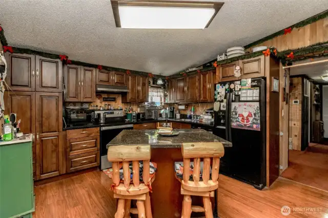 Kitchen with bar custom cabinets
